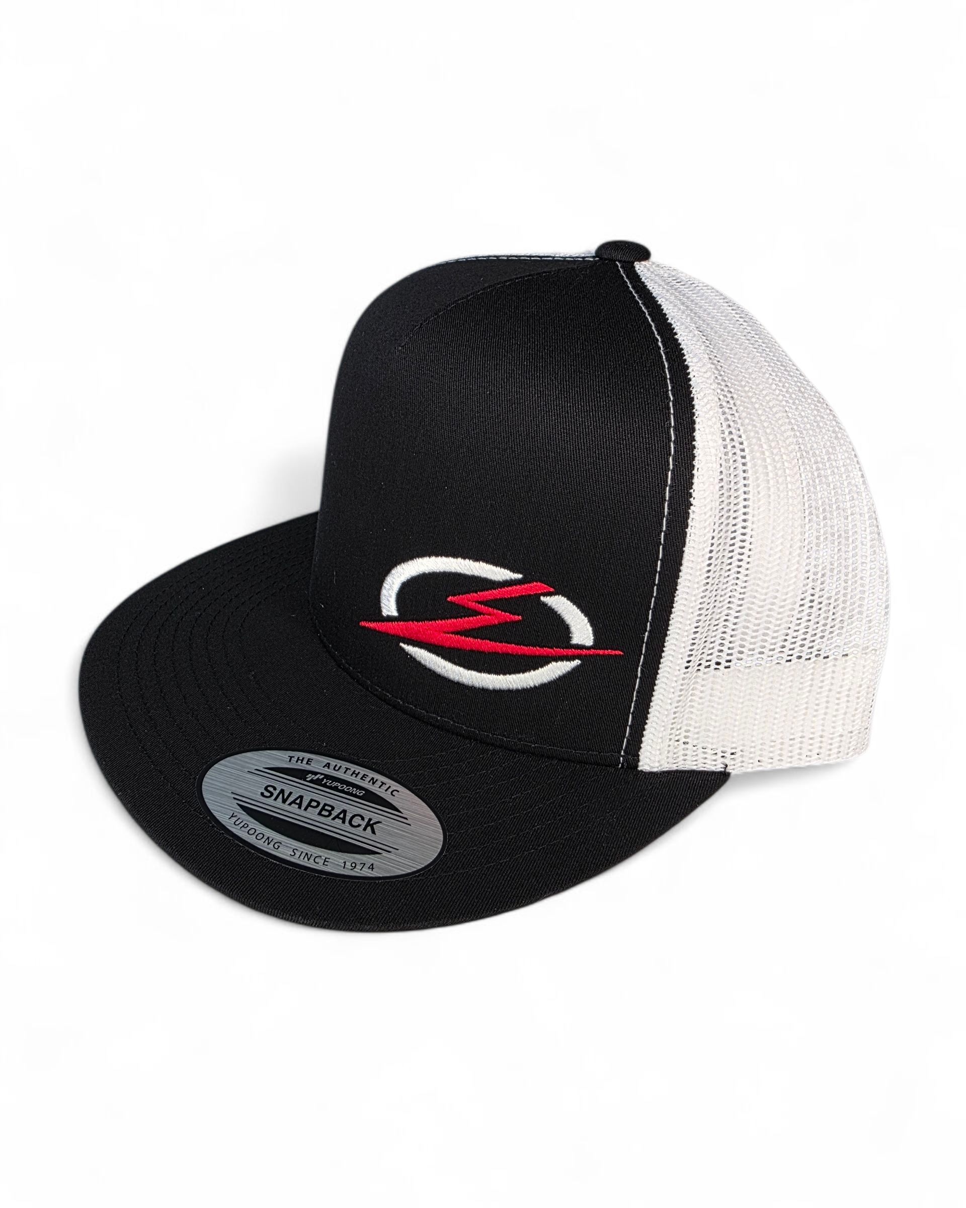Classic two-tone trucker hat with the Elektric Offroad logo. Poly-cotton blend, mesh back, adjustable snapback. One size fits most. Shop Elektric Offroad.