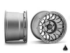 Assault Industries Standard XT Warrior Tires 35x10x15 on 15x10 Assault Industries Hellfire Matte Titanium 4/156 Pattern