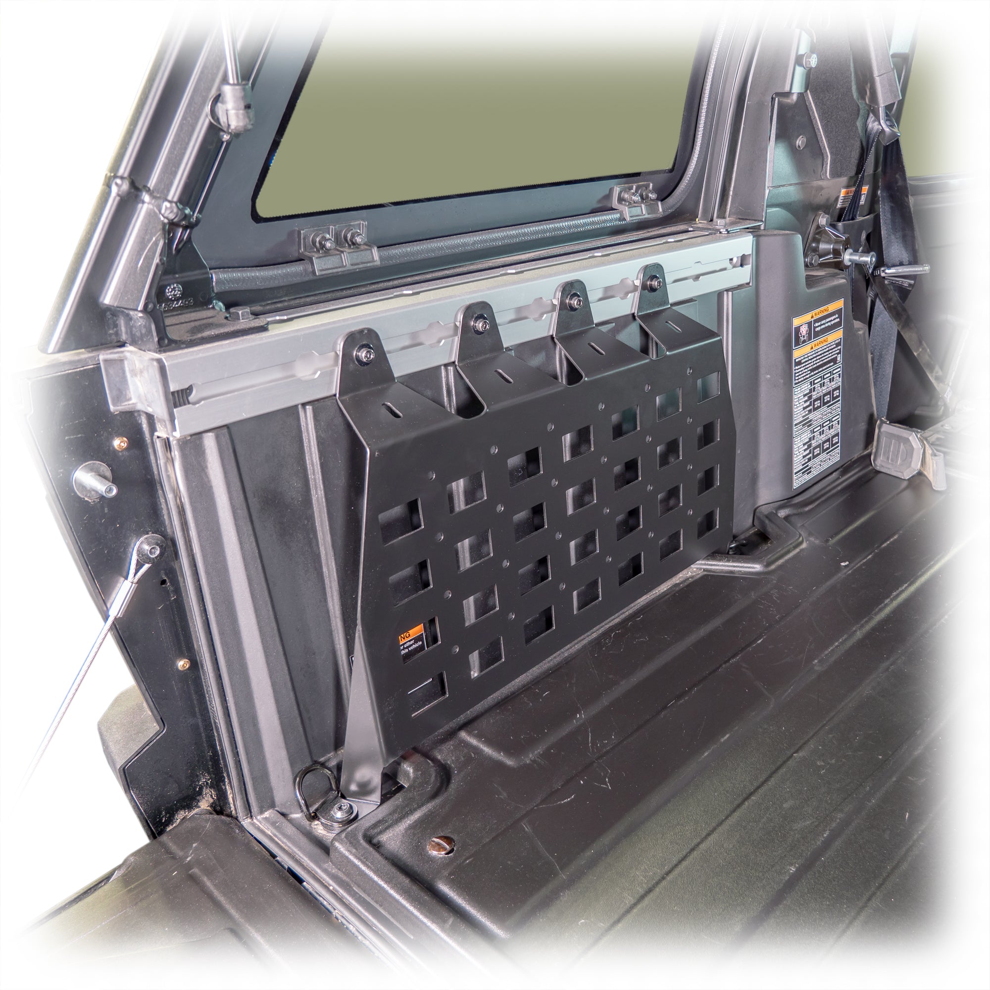 Adventure UTV cargo area outfitted with molle organization panels