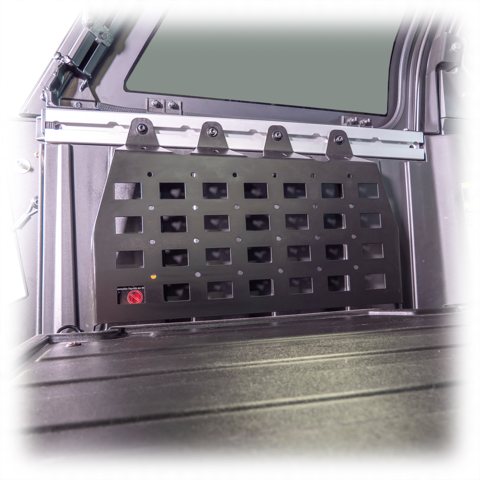 Close up of molle grid panels for cargo organization