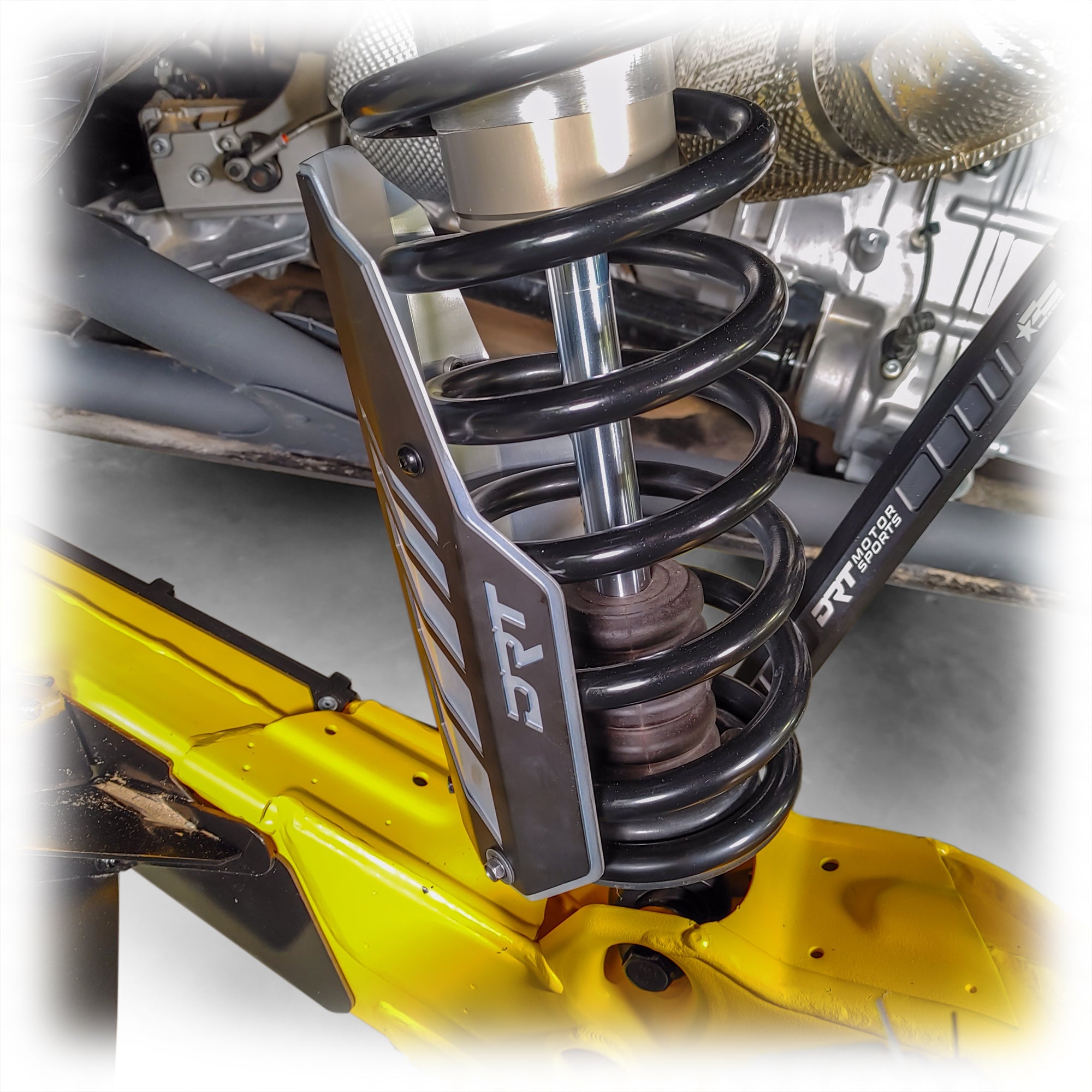 Shock guard kit rear Maverick R / X3 all-models, diverts debris, protects chromed shock shafts