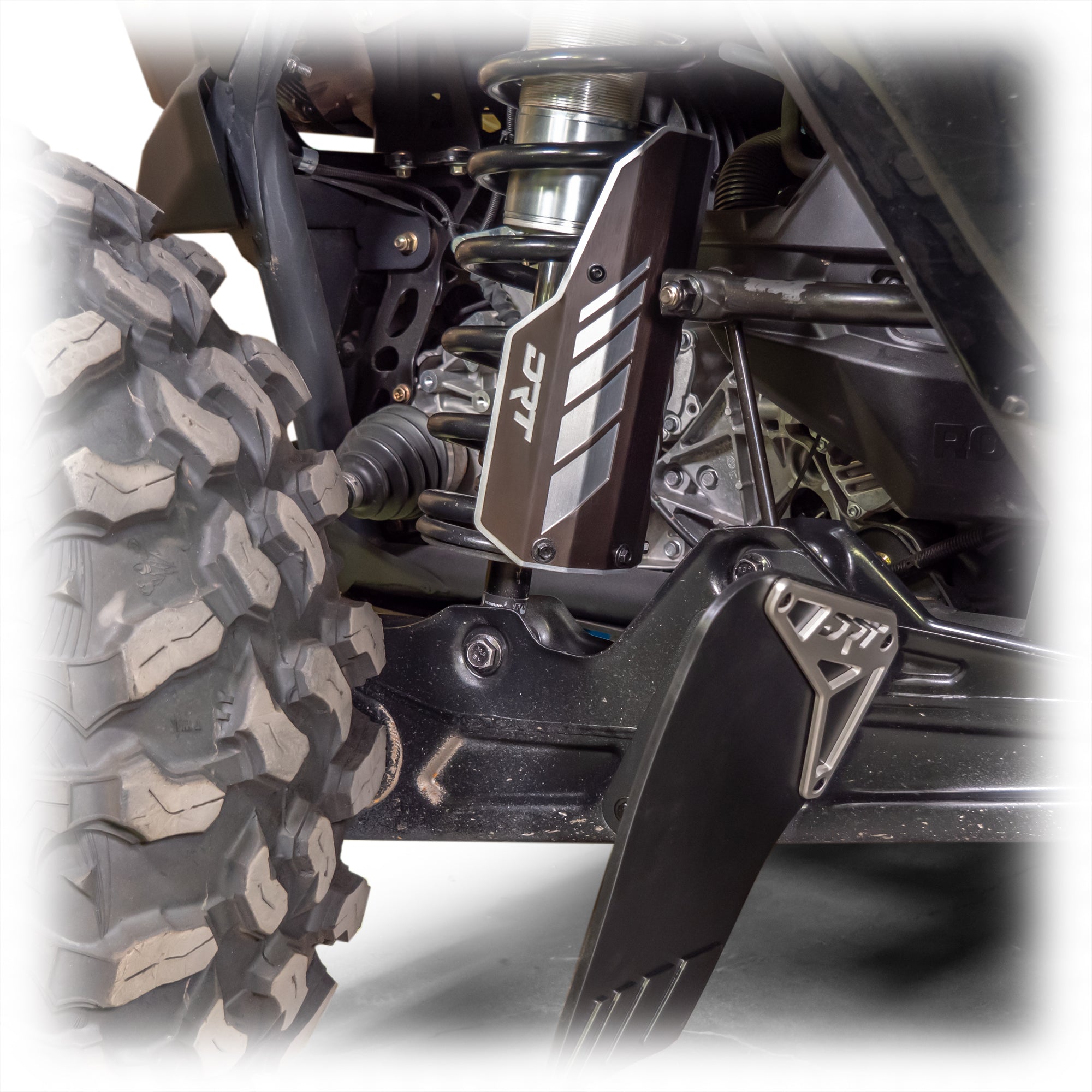 Rear aluminum shock guard set for Maverick R / X3, bold design, stainless hardware, ready to powder-coat