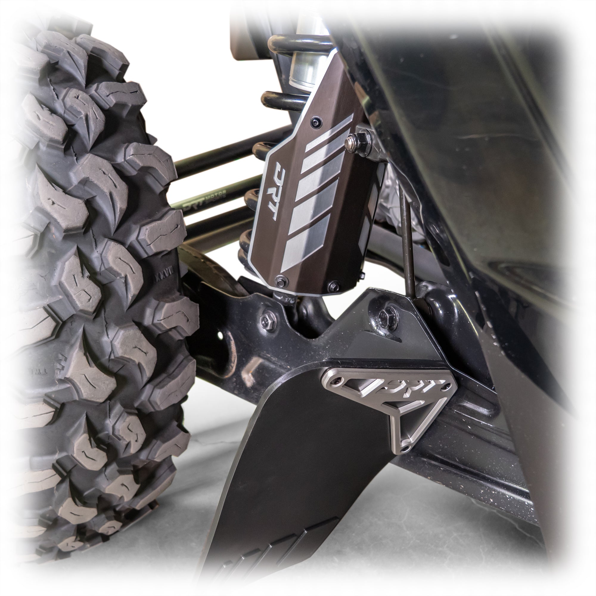 Durable rear shock guard set for Can-Am Maverick R 2024+ (also X3), black anodized finish, debris shield