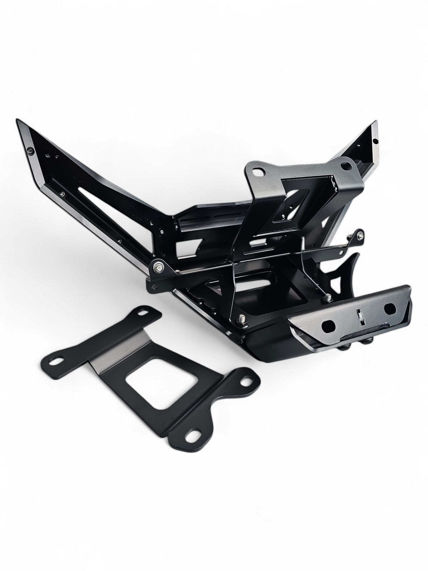 Hidden steel winch mount detail on black anodized Can-Am Maverick X3 billet front bumper showing frame-attached construction
