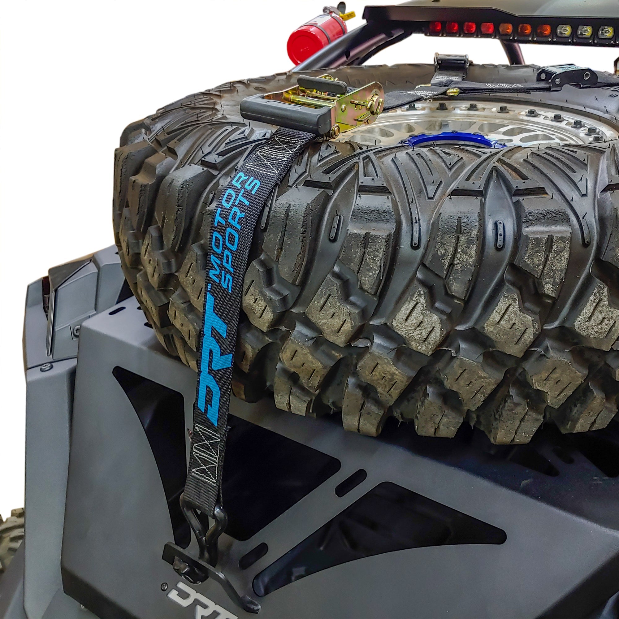 Rear view of Polaris RZR Pro R with DRT adventure rack and spare tire mount