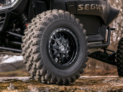 Assault Industries Standard XT Warrior Tires 32x10x15 on 15x7 Assault Industries Hellfire Matte Titanium Wheels 4/136 Pattern